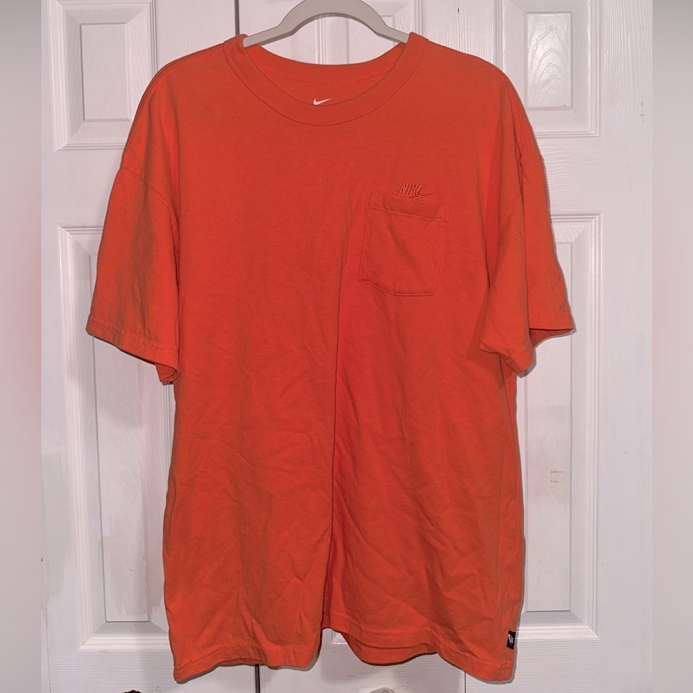 Men’s Neon Orange Nike T-shirt.